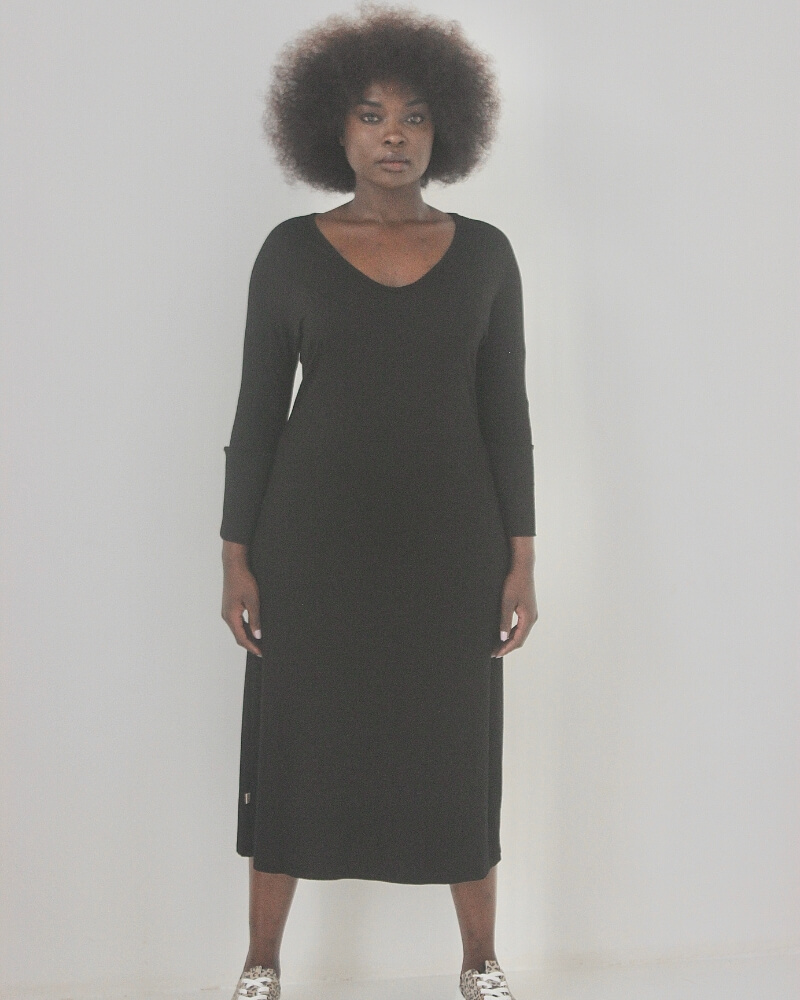 minimalist-black-midi-dress-soft-knit-elevé-boutique Minimalist Black Midi Dress – Soft Knit Comfort
